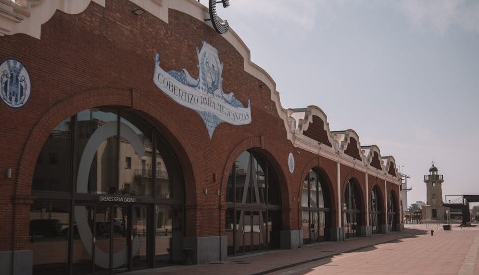 Facade of the Orenes Gran Casino in Castellón de la Plana, featuring classic architecture under a clear sky.