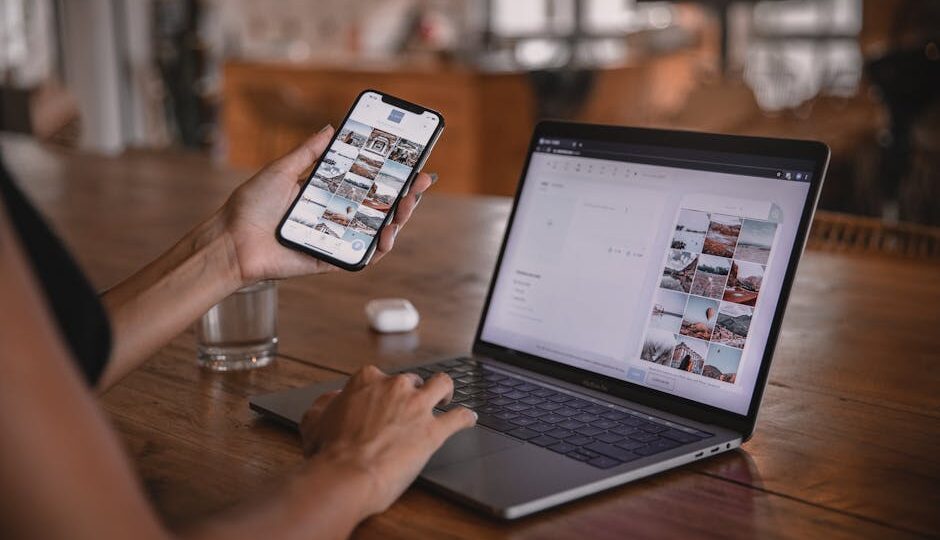 Woman edits social media content on phone and laptop at a cafe in Bali.