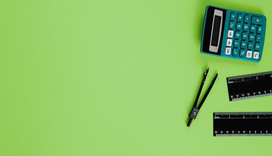 Calculator and drawing tools on a vibrant green background with ample copy space.